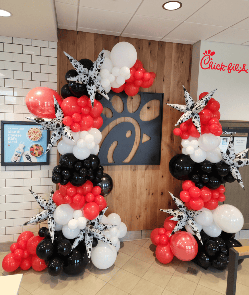 chick fil e boggy creek orlando balloon garland setup